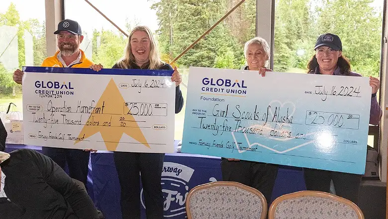 Operation Homefront and Girls Scouts of Alaska. After the check presentation