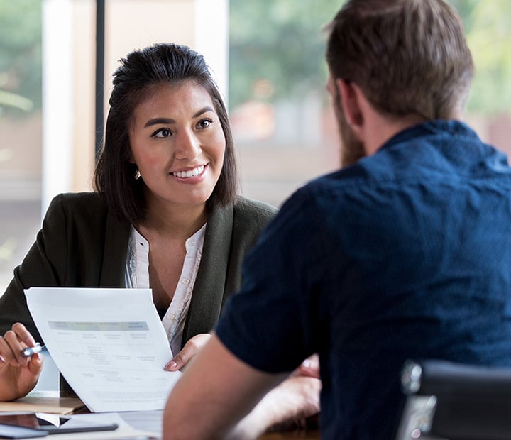 Financial professional meeting with a client